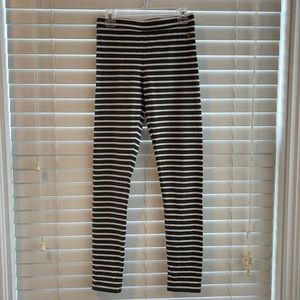 The brand is Matilda Jane. It’s a size 14. Olive green and white striped pants.